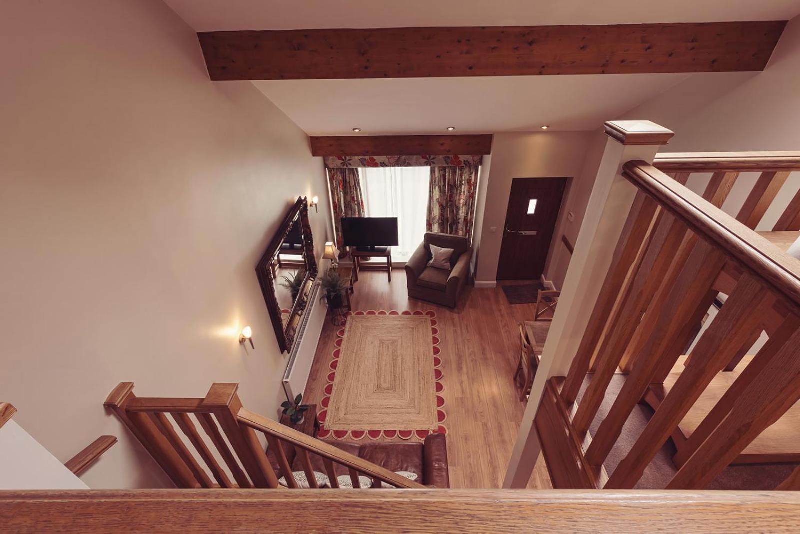 Longlands Inn&Cottages Carnforth Exteriör bild Interior of a chalet